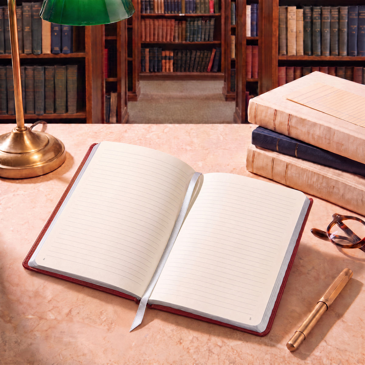 A Britannica Red Heritage journal open to its cream pages